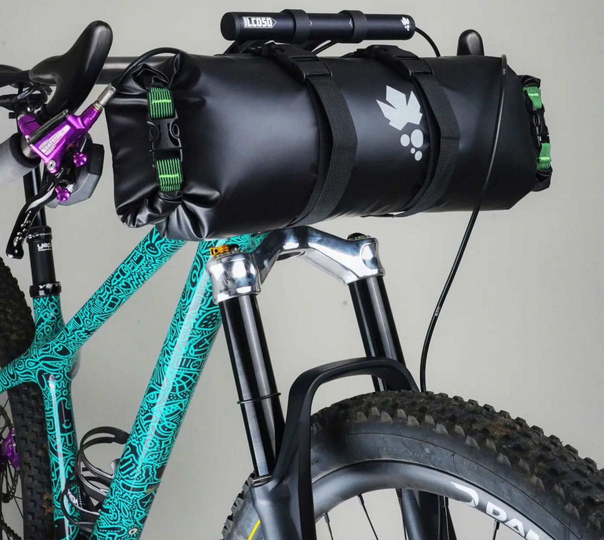 Miss Grape 8L waterproof dry bag for bikepacking, featuring handlebar mount, compact accessory for outdoor adventures.