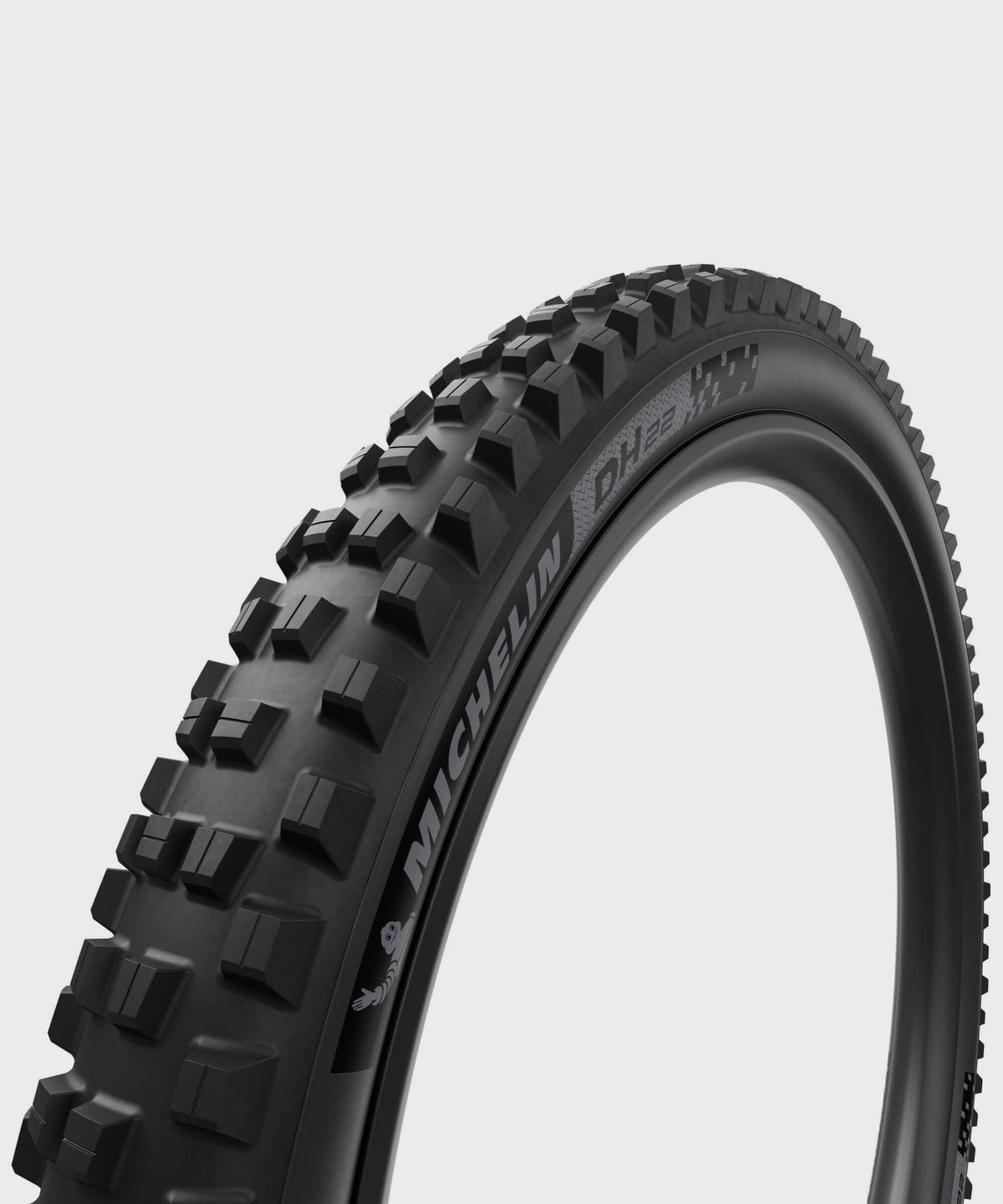 Michelin DH22 Racing Line downhill tubeless-ready mountain bike tyre on 27.5" or 29" wheel, with tread pattern suitable for downhill riding.