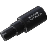 Shimano Spares TL-HB017 bike hub bearing remover tool for workshop bike maintenance, shown on a workbench.