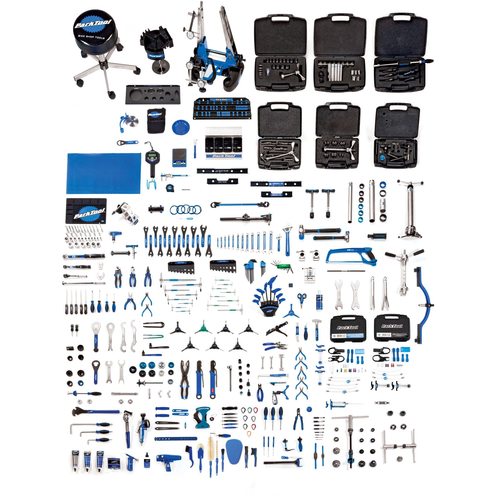 Park Tool MK-17 Master Mechanic Bicycle Repair Tool Set in a workshop setting with various bike repair tools and equipment.
