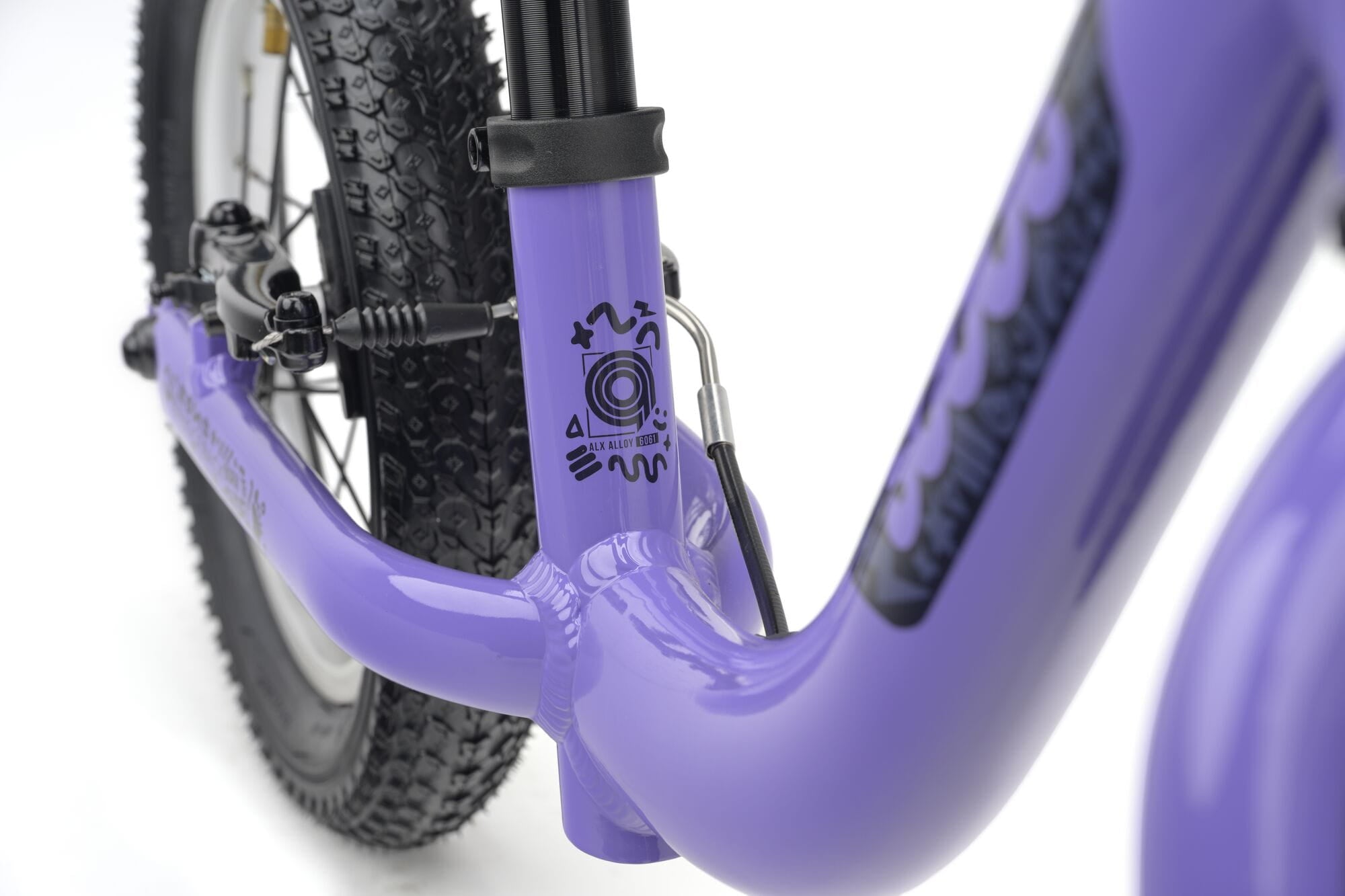 Ridgeback Scoot 2027 kids balance bike for toddlers, lilac color, close-up of the bike’s frame and handlebar.