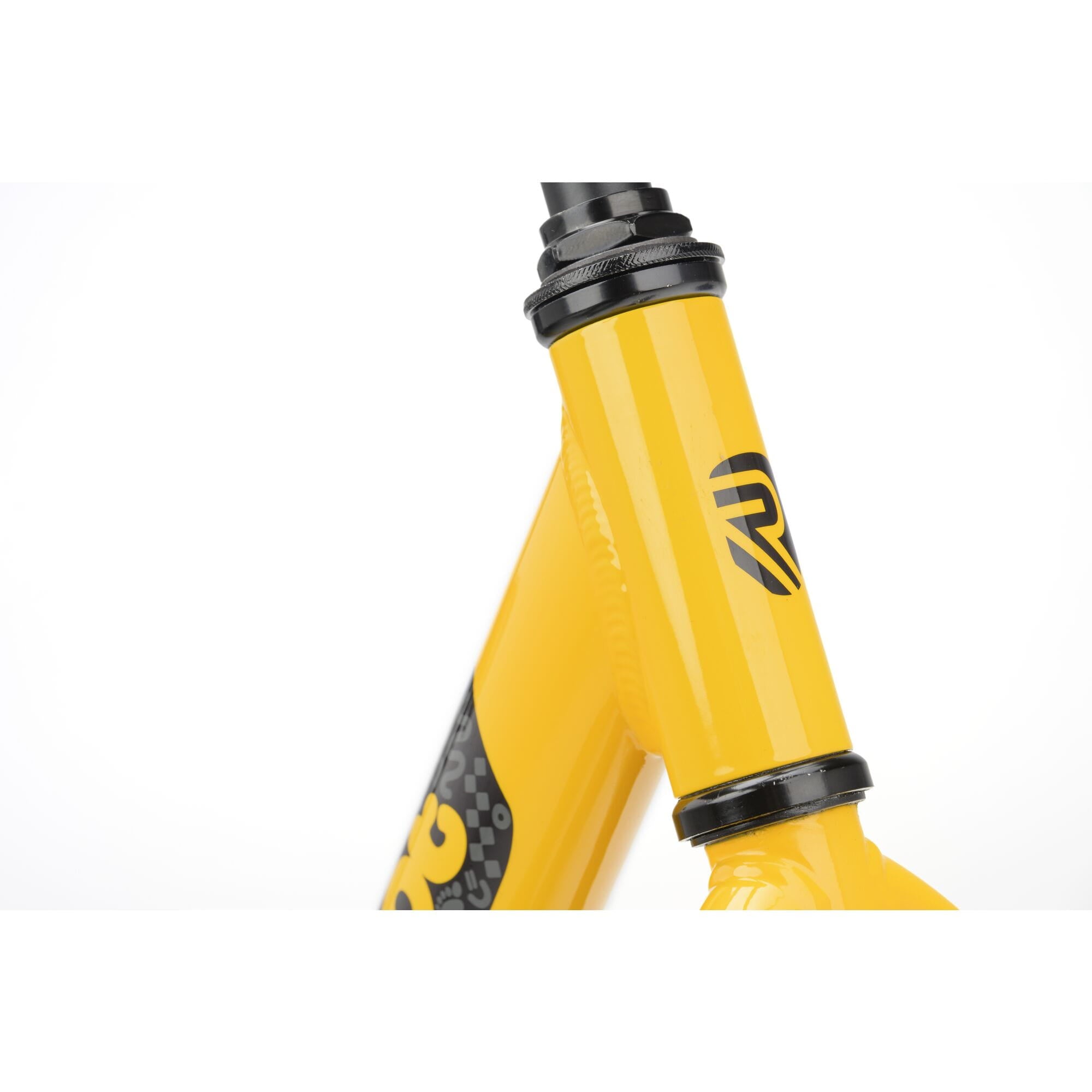 Yellow Ridgeback Scoot XL kids balance bike with 14-inch wheels, designed for beginner riders aged 3 and up.