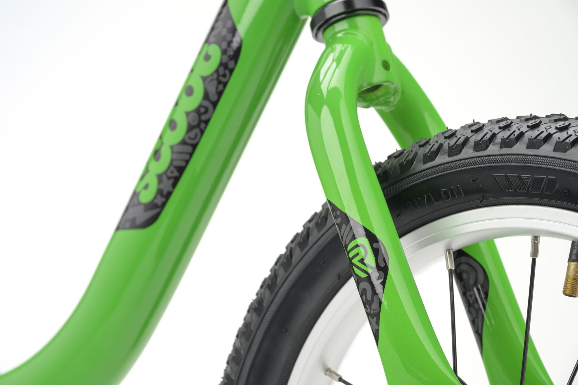 Green Ridgeback Scoot XL kids balance bike with 14-inch wheels, suitable for beginner riders aged 3 and up.