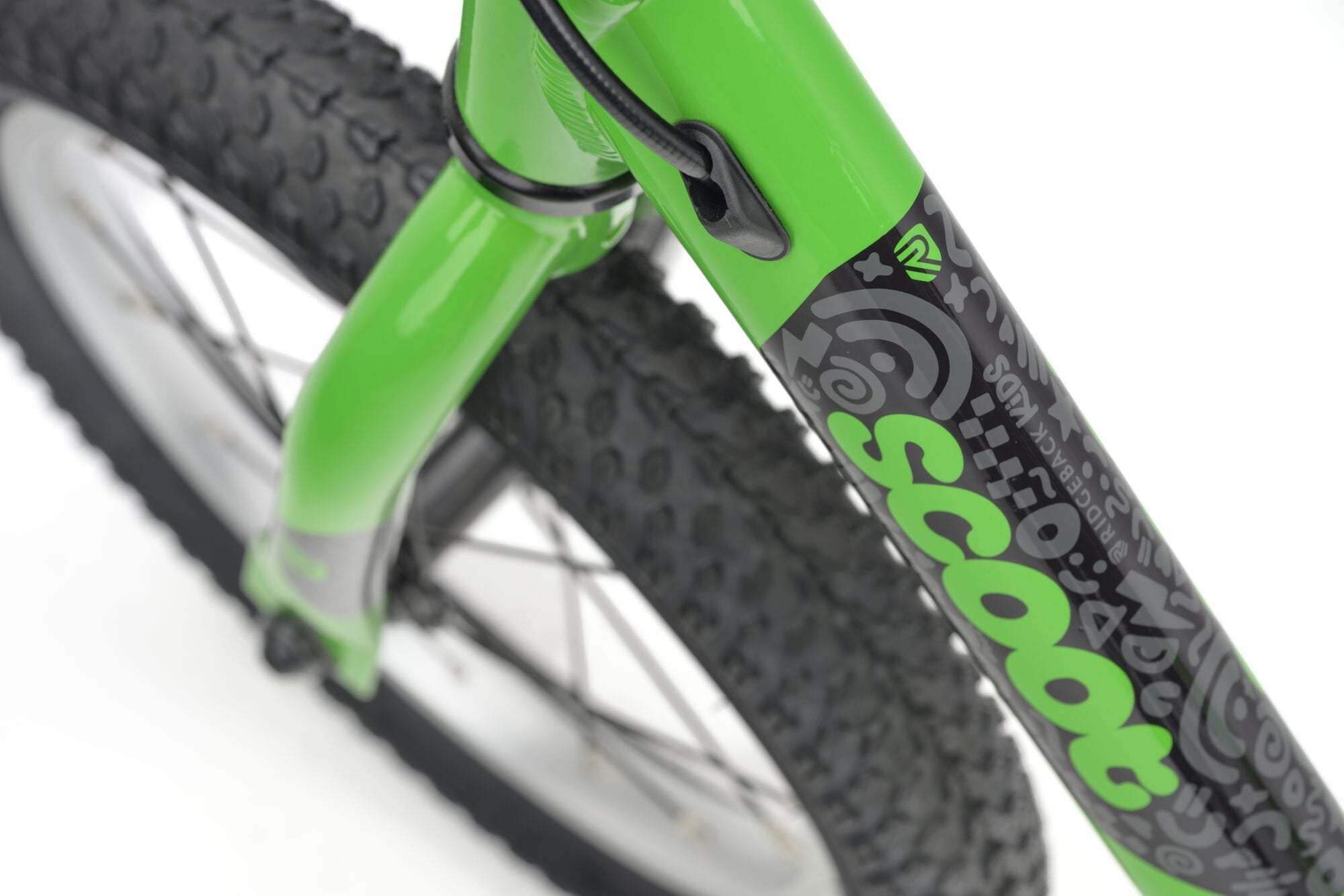 Green Ridgeback Scoot XL kids balance bike, 14-inch model for ages 3+, designed for beginner riders.