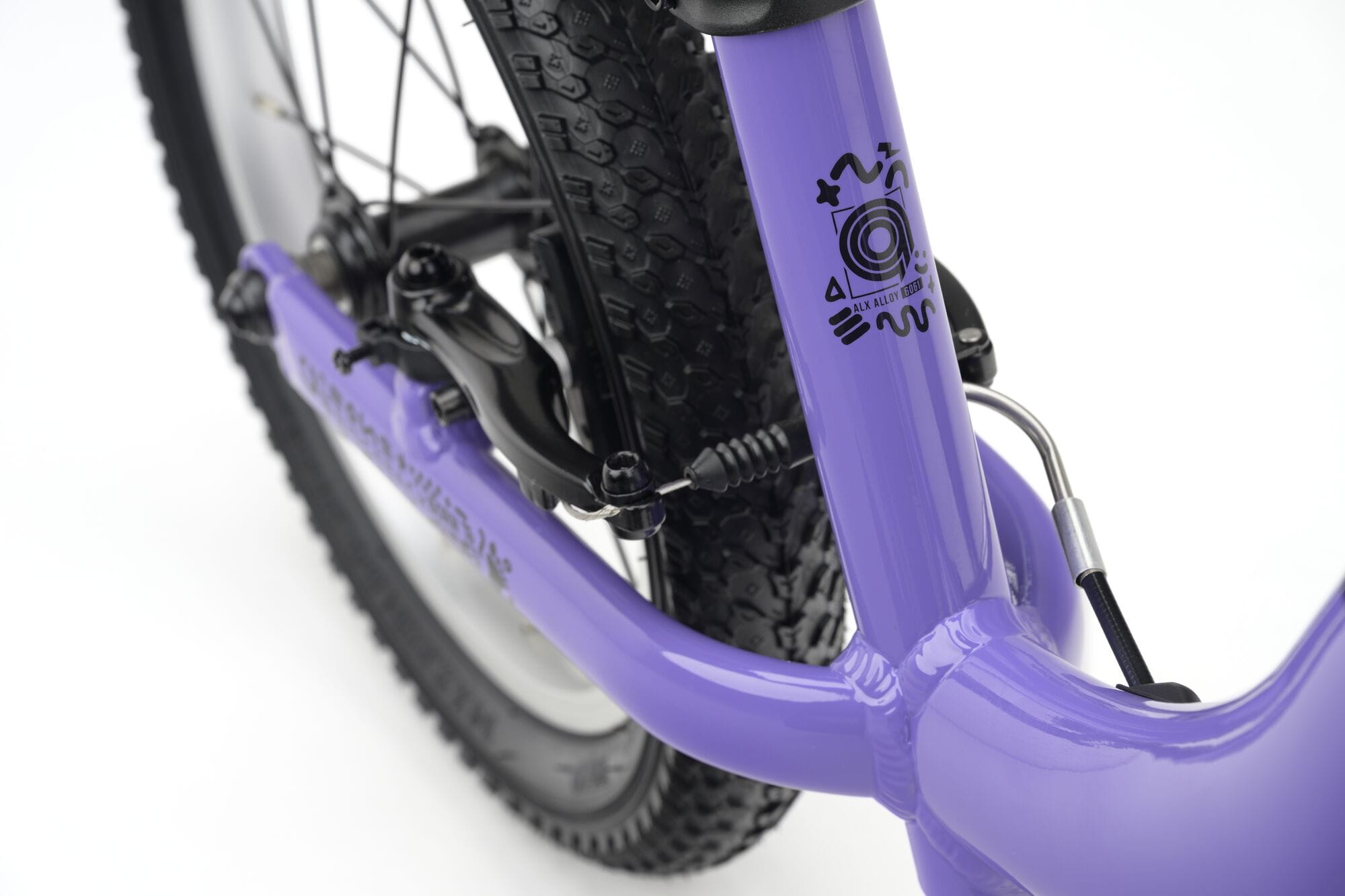 Ridgeback Scoot XL 14-inch kids' balance bike in lilac, designed for beginner riders aged 3 and up.