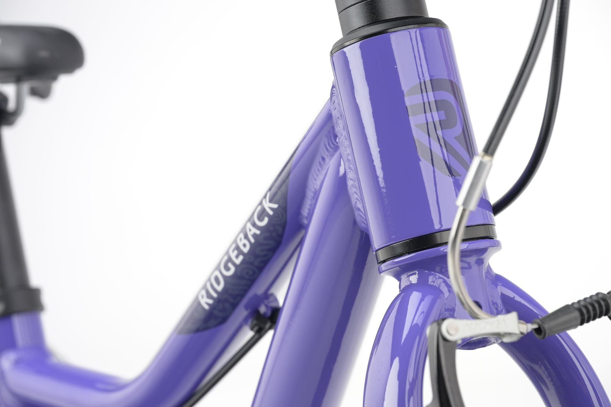 Ridgeback MX16 kids bike with 16-inch wheels, lilac color, adjustable frame for ages 3.5 to 6 years, detailed close-up.