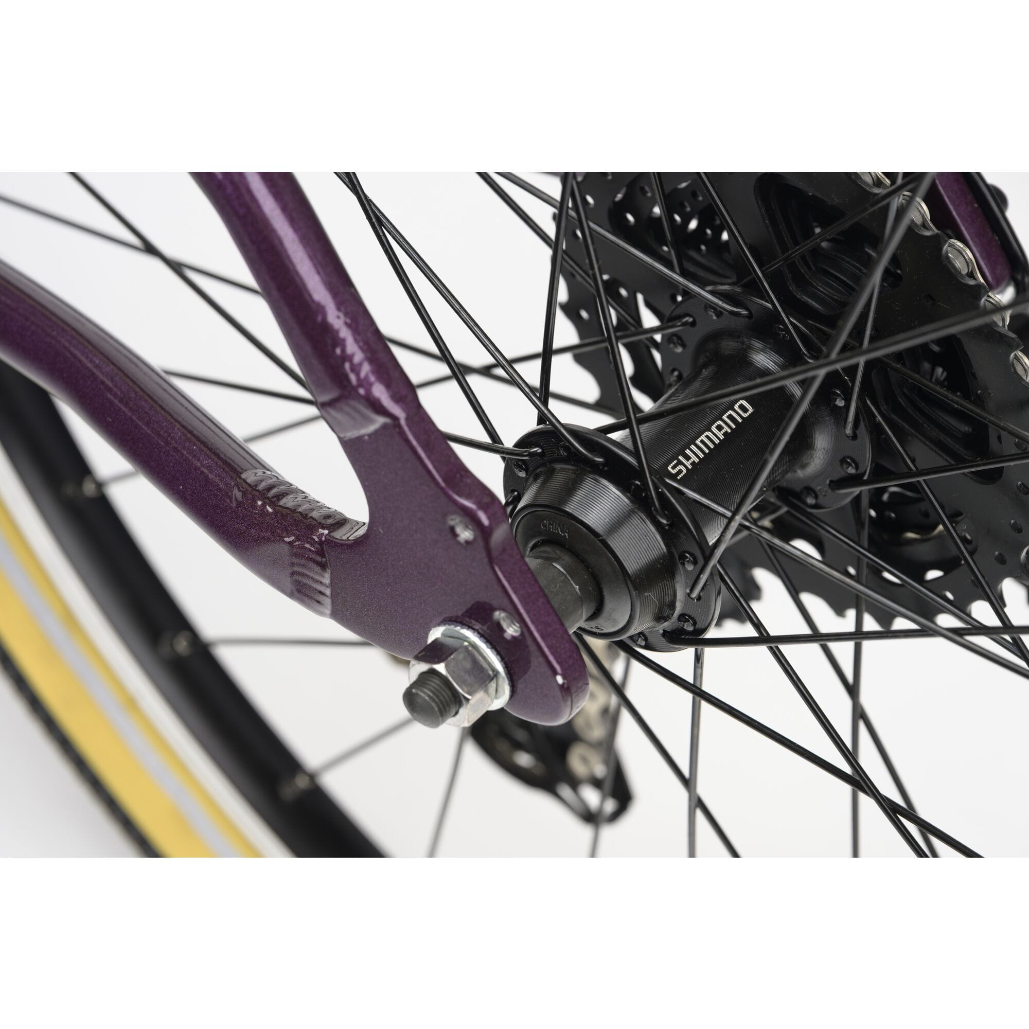 Ridgeback Dimension 24 kids' bike with violet frame, 8-speed Shimano gears, puncture-resistant tires, adjustable fit for ages 8+