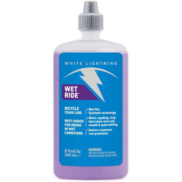 White Lightning Wet Ride synthetic chain lube in an 8oz bottle, designed for wet and muddy cycling conditions.