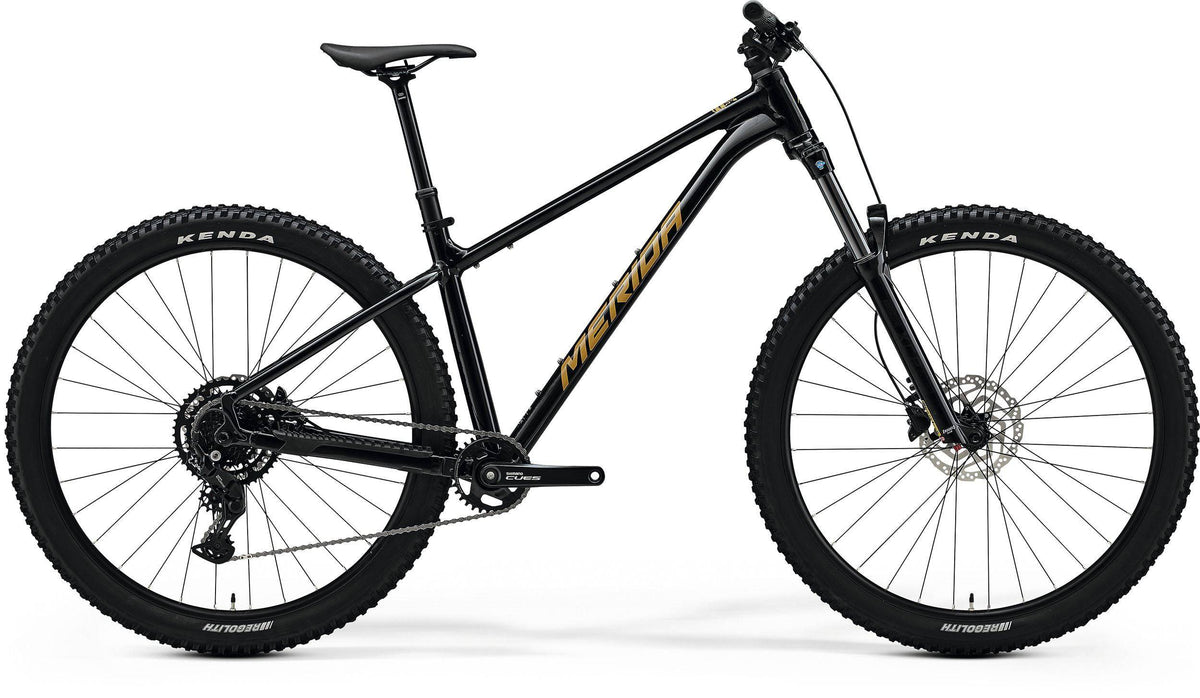 Merida Big Trail 300 MY26 29-inch hardtail mountain bike with Shimano CUES U4000 components, black frame and knobby tires.