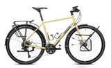 Genesis Tour de Fer 10 2026 touring bike with Shimano Cues 2x9-speed drivetrain, front and rear racks, ready for adventure.