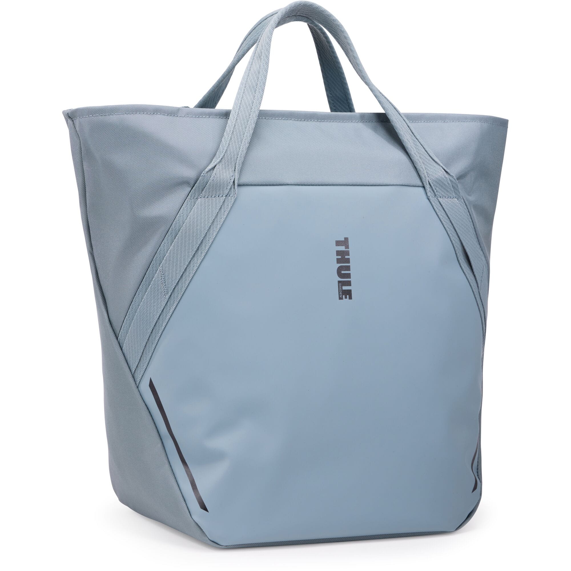 Thule Chasm Tote InLock 25L water-resistant bike rack compatible tote bag with adjustable straps and sturdy handles.