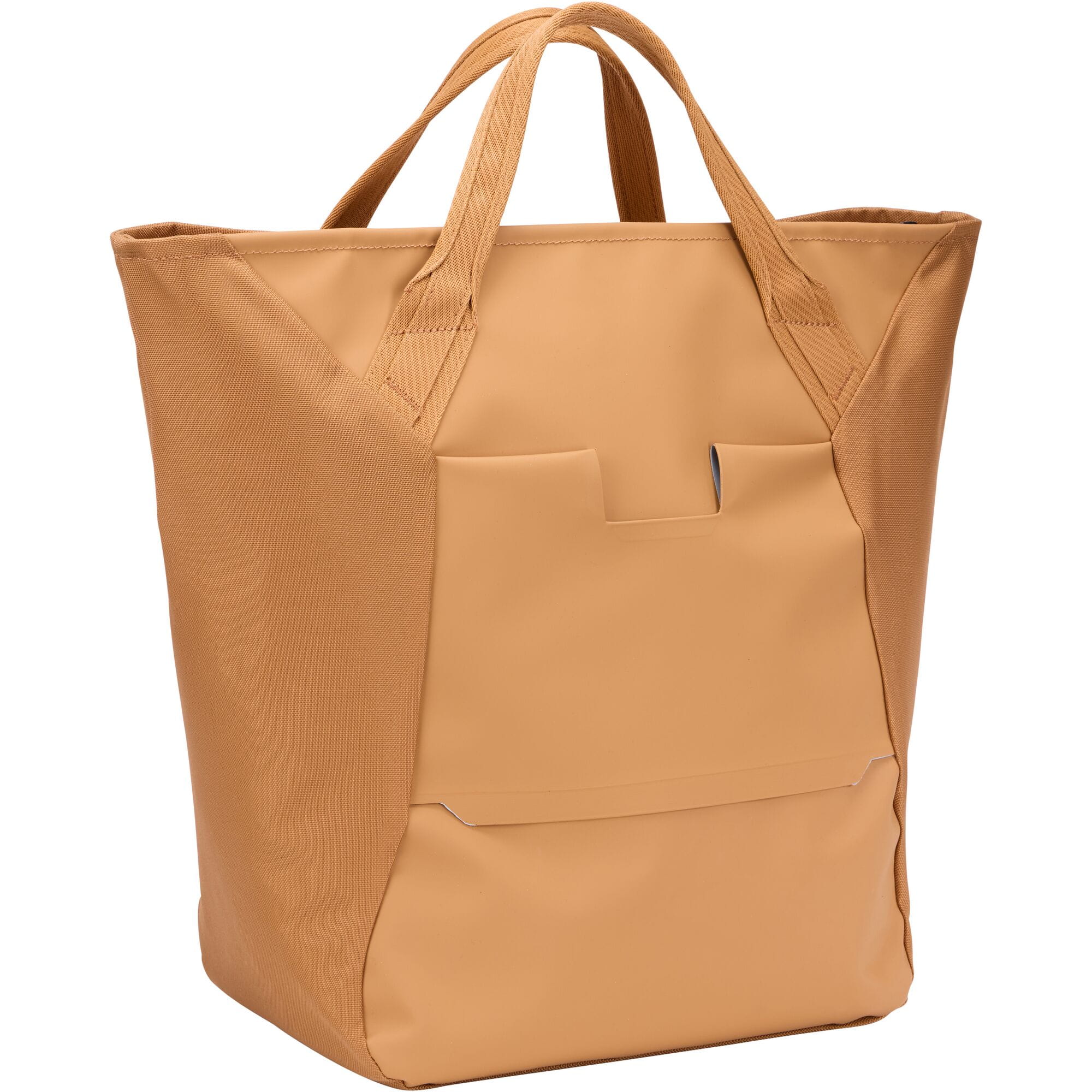 Thule Chasm Tote InLock 25L water-resistant tote bag with bike rack compatibility, shown with its sturdy handles and sleek design.