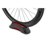 Elite Su-Sta adjustable front wheel elevator block for indoor cycling trainers, supporting bike stability and height adjustment.