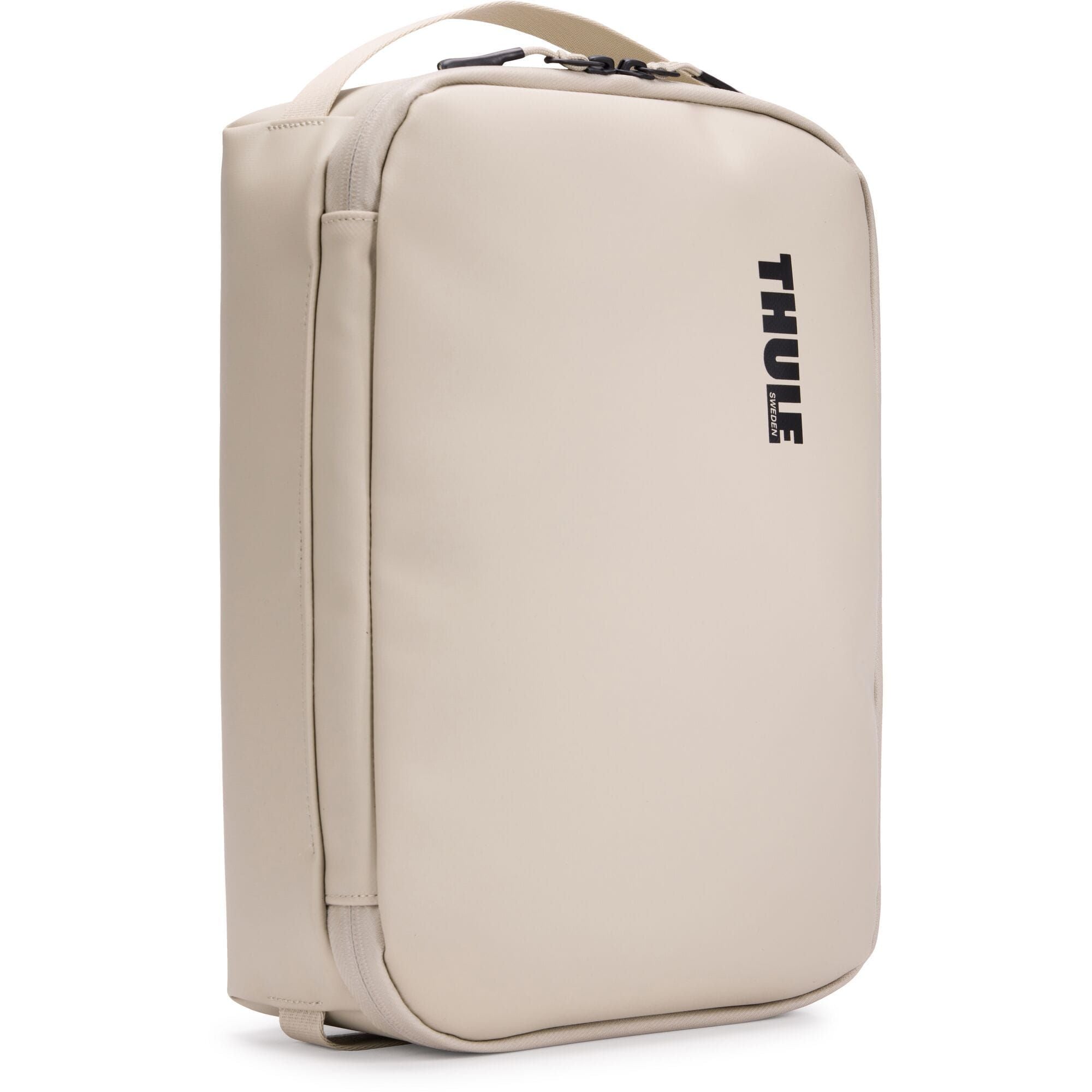 Thule Chasm Medium Gear Cube Soft Sand weather-resistant organizer bag with multiple compartments for accessories.