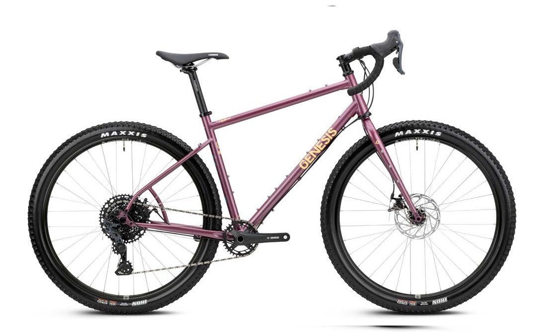 Genesis Vagabond 10 gravel bike with 10-speed MicroShift drivetrain and TRP Spyre mechanical brakes, featuring a rugged frame and knobby tires.